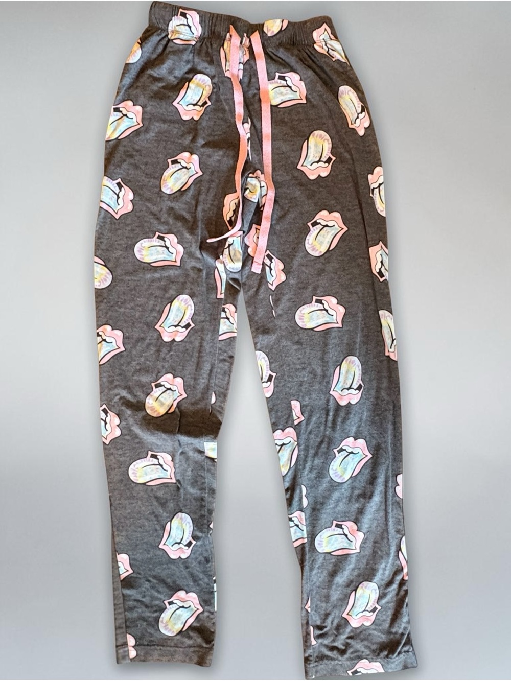 the Rolling Stones Womens Charcoal Pajama Pants with Pink Tongue Motif. Size XS